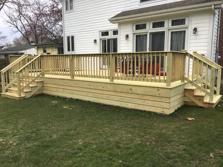 Solid skirting to ground. A-Affordable Decks Lombard IL