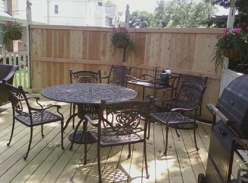 Wood deck Clarendon Hills, IL. Re-planked, new steps, and privacy screen. A-Affordable Decks of Lombard. For a free in-home consultation phone 630-620-4130 