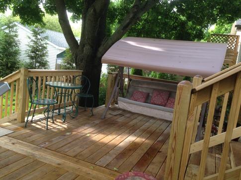 A shady retreat in Glen Ellyn IL. Wood and vinyl deck contractor A-A-Affordable Decks